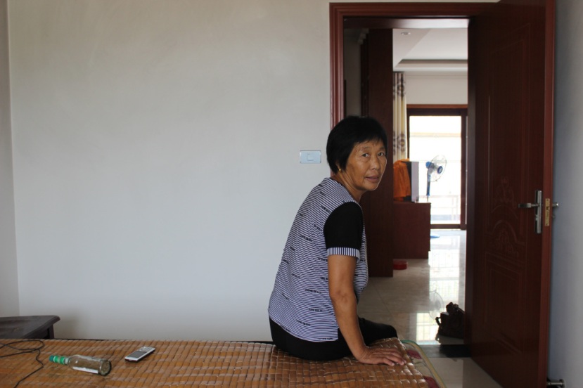Wang Tonghuan, one of hundreds of relocated residents who now live in Jijiagou Village near Danjiangkou. Quartz / Lily Kuo. 